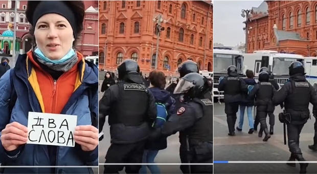 Mosca, mostra un cartello con «due parole»: e in due secondi viene portata via dalla polizia