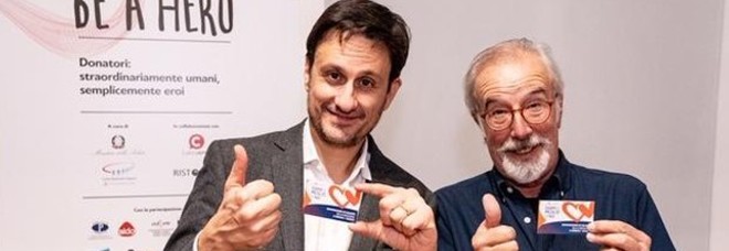 A sinistra, Emanuele Vietina direttore di Lucca Crea, a destra Giorgio Cavazzano, autore di Paperino